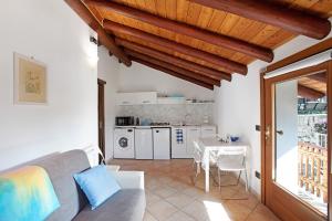 Kuchyň nebo kuchyňský kout v ubytování Casa Sabrina - Appartamento Bianco