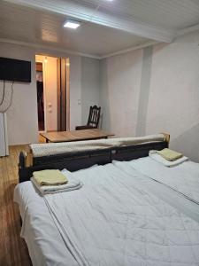 Postel nebo postele na pokoji v ubytování Guest house 2 floor