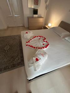 Cama ou camas em um quarto em B&B Baciami Ancora