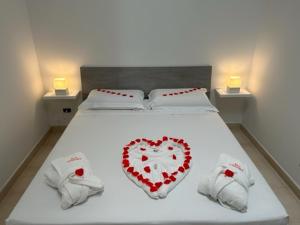 Cama ou camas em um quarto em B&B Baciami Ancora
