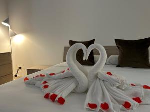 Cama ou camas em um quarto em B&B Baciami Ancora