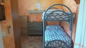 Postel nebo postele na pokoji v ubytování I Mari Di Gallura Suites and Rooms