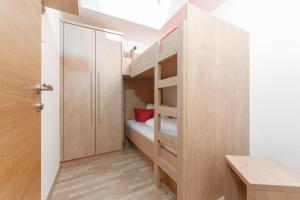 Posteľ alebo postele v izbe v ubytovaní Appartement Oskar