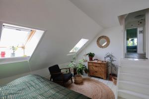 En eller flere senge i et værelse på The Explorer's Hostel