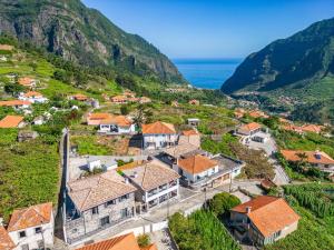 an aerial view of a village on a mountain at Basalt Dwelling I by Madeira Sun Travel in São Vicente