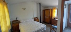 A bed or beds in a room at Casa San Sebastian