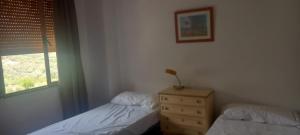 A bed or beds in a room at Casa San Sebastian