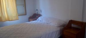 A bed or beds in a room at Casa San Sebastian