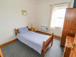 Katil atau katil-katil dalam bilik di 13 Trawmore Cottages