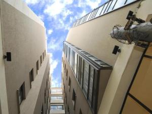 a view of the sky from between two buildings at Andino Apartaments Rental Capital in San Juan