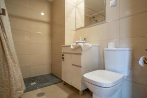 Koupelna v ubytování Vista Vieira Apartments + 13 fotografií