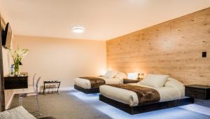 Postel nebo postele na pokoji v ubytování Hotel Viza