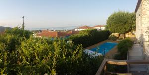 The swimming pool at or close to FEEL LIKE HOME IN LESVOS