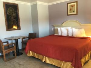 Postel nebo postele na pokoji v ubytování Budget Inn Plainview