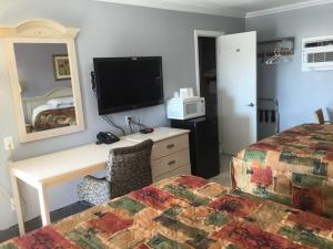 Postel nebo postele na pokoji v ubytování Budget Inn Plainview