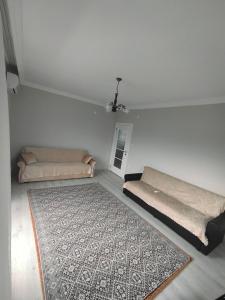 Un pat sau paturi într-o cameră la Dublex daire