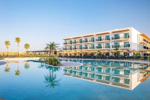 a view of the hotel from the pool at AP Cabanas Beach & Nature - Adults Friendly in Cabanas de Tavira