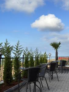 a group of chairs and tables on a patio at Dolce Bella Suites in Trabzon