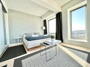 Postel nebo postele na pokoji v ubytování AP City Suite - City View over Tampere and Best Location