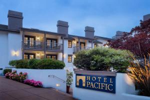 a hotel tactic sign in front of a building at Hotel Pacific in Monterey