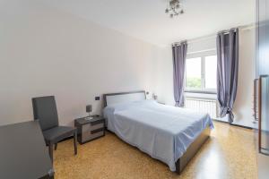 Postel nebo postele na pokoji v ubytování 193 - Casa Via della Chiusa - centralissimo e vicino alla baia del silenzio, spiaggia e mare 150m - Parcheggio GRATIS incluso e Aria condizionata