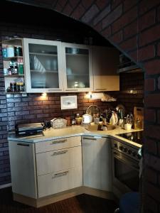 Η κουζίνα ή μικρή κουζίνα στο Rosy Apartment near Kuressaare Castle