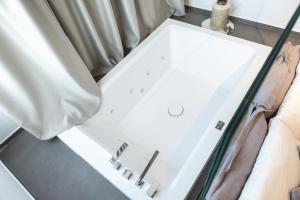A bed or beds in a room at Vigna Caracciolo