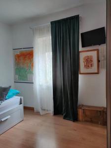 A bed or beds in a room at Piccolo Appartamento Casa Vacanze B&B Angela