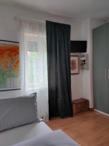 A bed or beds in a room at Piccolo Appartamento Casa Vacanze B&B Angela