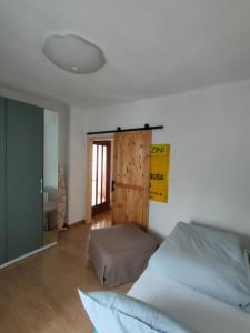 A bed or beds in a room at Piccolo Appartamento Casa Vacanze B&B Angela