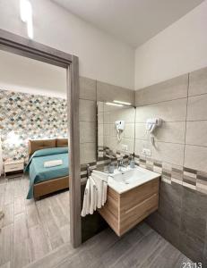 Postel nebo postele na pokoji v ubytování Costa degli Dei Rooms