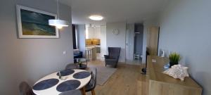 Posedenie v ubytovaní Mieszkanie, apartament z przepięknym widokiem, blisko starówki, plaży