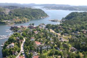 an aerial view of a town next to a body of water at Bergland apartment 23 - close to the center of Kragerø in Kragerø