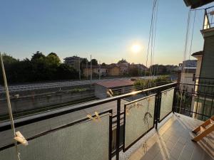 a balcony with a view of a street at Stazione a 400 metriTeds Home in Melegnano