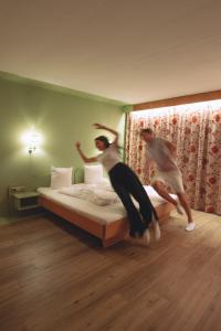 Llit o llits en una habitació de PhiliPop-Up Hostel
