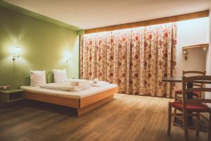 Llit o llits en una habitació de PhiliPop-Up Hostel