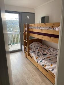 Postel nebo postele na pokoji v ubytování Appart 6 personnes, balcon plein sud