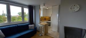 Kuchyňa alebo kuchynka v ubytovaní Mieszkanie, apartament z przepięknym widokiem, blisko starówki, plaży + 11 fotografií