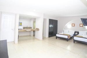 Postel nebo postele na pokoji v ubytování Hotel Caribe Internacional Cancun