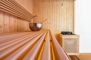 a bowling lane with a bucket on top of it at Chalet Zenspace in Le Grand-Bornand