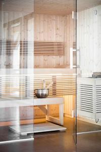 a kitchen with a counter with a bowl on a table at Chalet Zenspace in Le Grand-Bornand