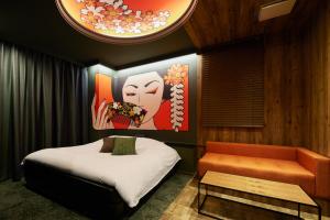Postel nebo postele na pokoji v ubytování Nagoya Hotel HOQA Hanaironoyu