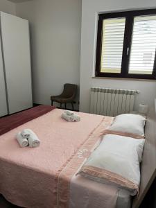 A bed or beds in a room at Dimora Di Bari