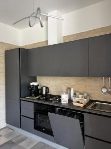 A kitchen or kitchenette at Dimora Di Bari