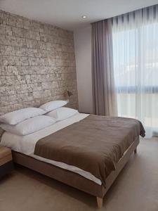 Llit o llits en una habitació de Apartamento Santiago de La Ribera