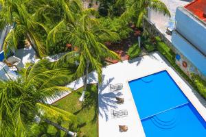 Bazén v ubytování Hotel Caribe Internacional Cancun nebo v jeho okolí