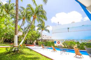 Bazén v ubytování Hotel Caribe Internacional Cancun nebo v jeho okolí