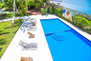 Bazén v ubytování Hotel Caribe Internacional Cancun nebo v jeho okolí