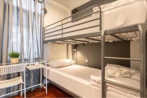 Postel nebo postele na pokoji v ubytování Tuk Tuk House 250m from MRT Sirikit