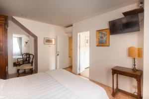 Posteľ alebo postele v izbe v ubytovaní Campiello Zen B&B